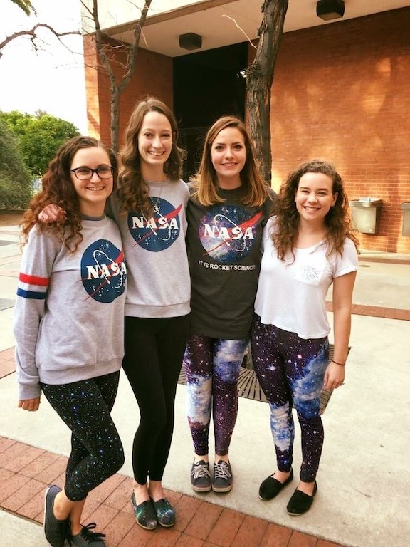 Marina and friends wear NASA space outfits at a UA Astronomy club meeting